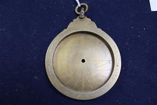 An Islamic brass astrolabe